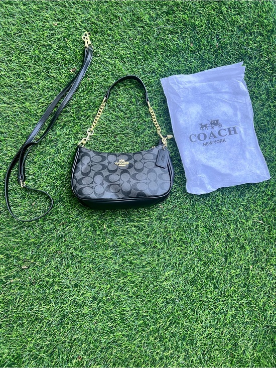 Coach Handbags - Coach Black Signature Canvas Shoulder Bag with Gold Hardware
